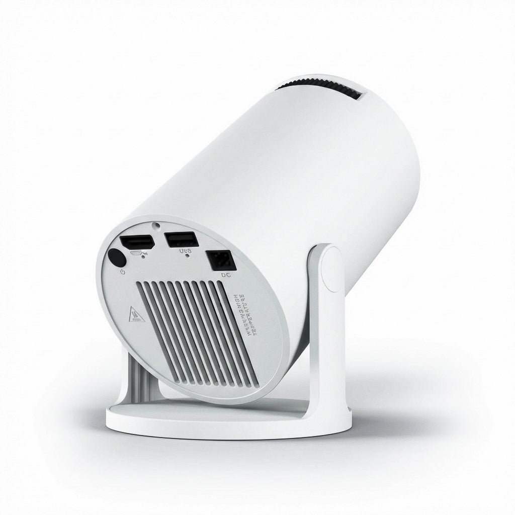 The NEW Spotlight Projector by The Projection Room features a sleek white cylindrical design with USB, HDMI, and DC input ports plus a cooling vent—ideal for any modern apartment setup.