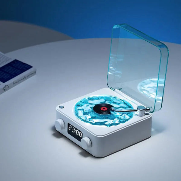 The Projection Rooms Vinyl Speaker Lamp with Water Ripple RGB Light features a blue cover and delivers high-quality sound for your vinyl collection.
