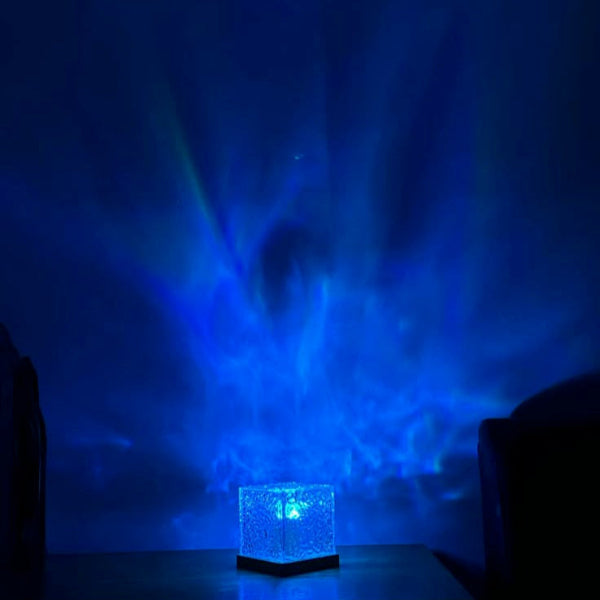 Ocean wave lamp projecting blue lights on the wall