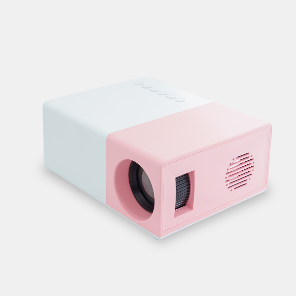 The Projection Rooms Mini Projector Pro is a compact device with a pink front and white body, set against a plain white backdrop. Its universal compatibility and design, featuring a left-mounted lens and right vent, make it both stylish and functional.