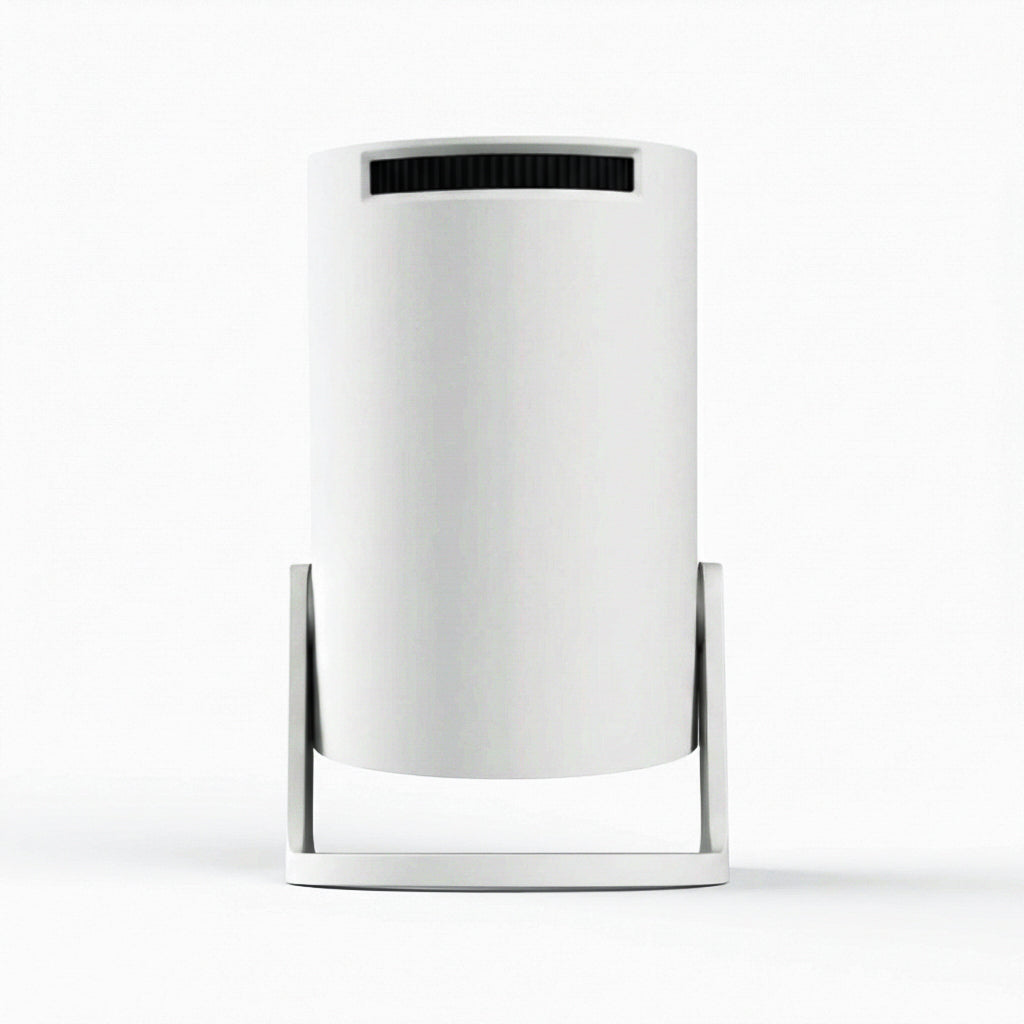 The NEW Spotlight Projector by The Projection Room features a modern cylindrical design with a sleek white body and black top vent, set on a matching stand—ideal for enhancing any contemporary apartment’s style.