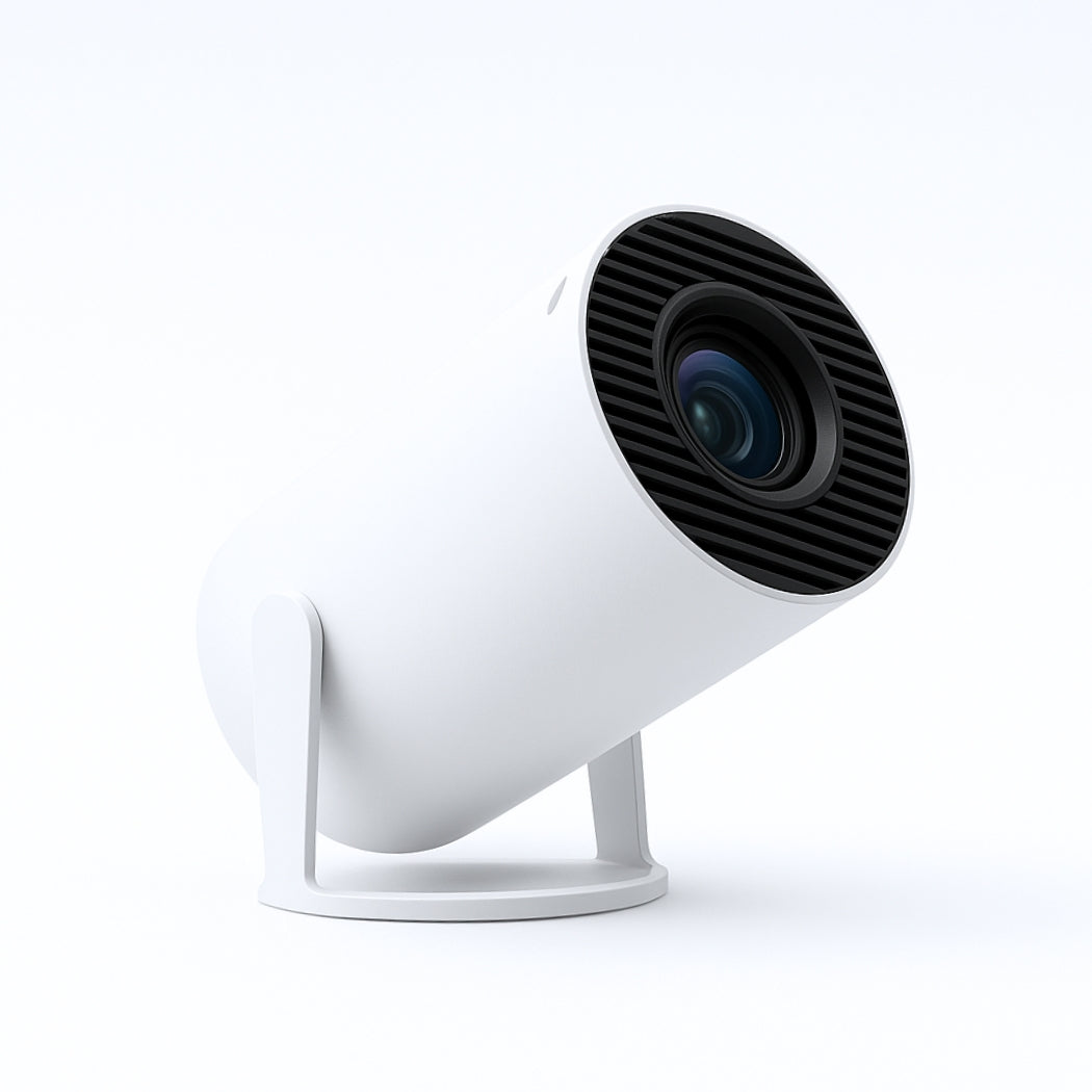 The Spotlight Projector by The Projection Room is a modern white cylindrical spotlight with a black lens, angled upward on a minimalist stand—ideal for portable entertainment in any setting.